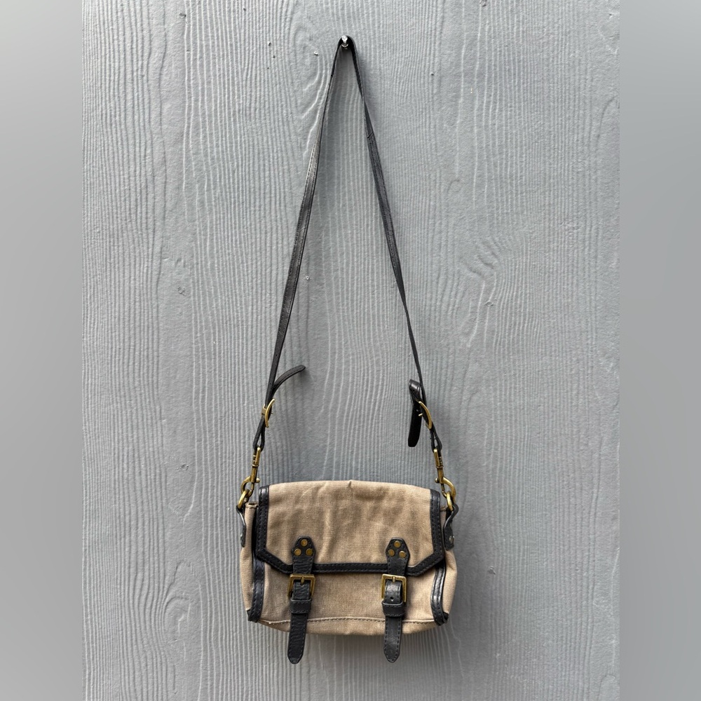 Madewell 1937 Brand waxed canvas wi the black leather accents purse.
